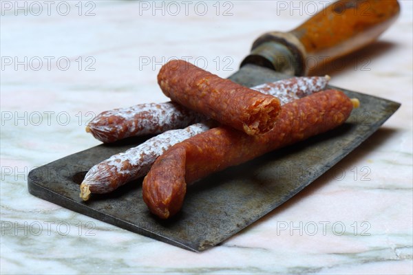 Different kinds of sausages on a chopper