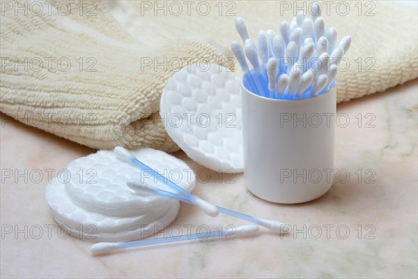 Cotton swabs and cotton pads