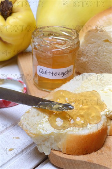 Slice of butter plait with quince jelly