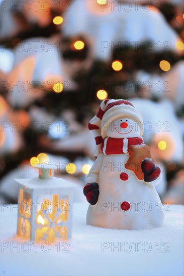 Atmospheric outdoor Christmas decoration with snowman