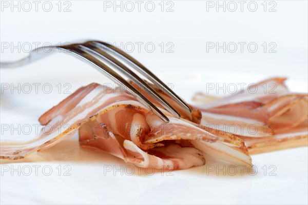 Bacon with fork