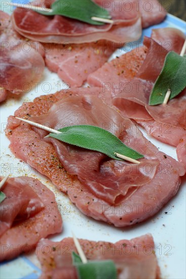 Preparation of Saltimbocca alla romana