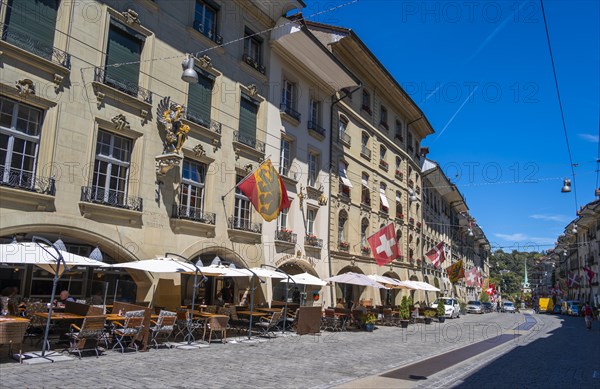 Flags on a row of houses in the old town of Bern