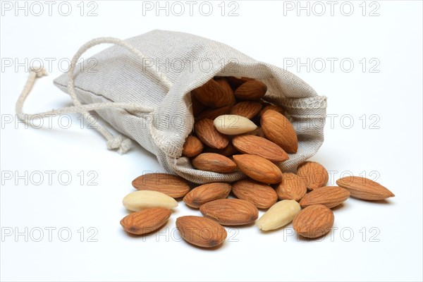 Sweet almonds in linen bags