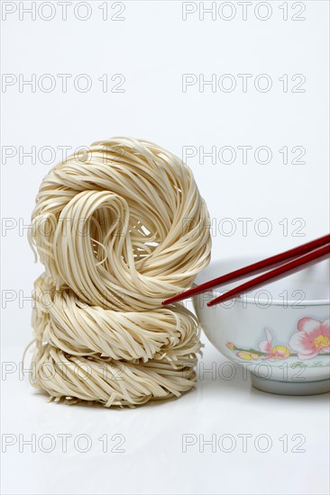 Chinese noodles and bowl with chopsticks