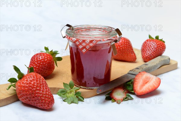 Strawberry jam in glass