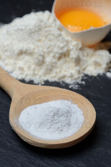 Baking powder in cooking spoon