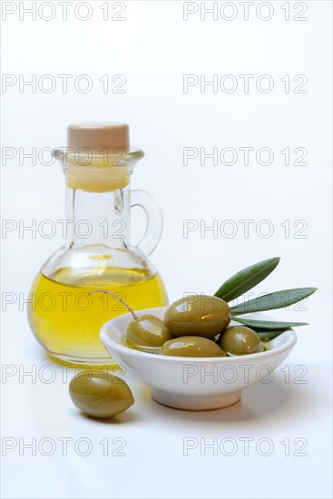 Green olives in shell and bottle olive oil