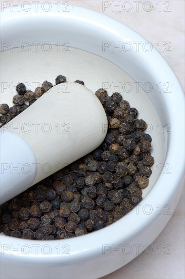 Tellicherry pepper in mortar