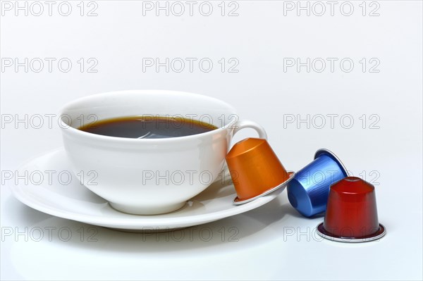 Coffee capsules and coffee cup with coffee