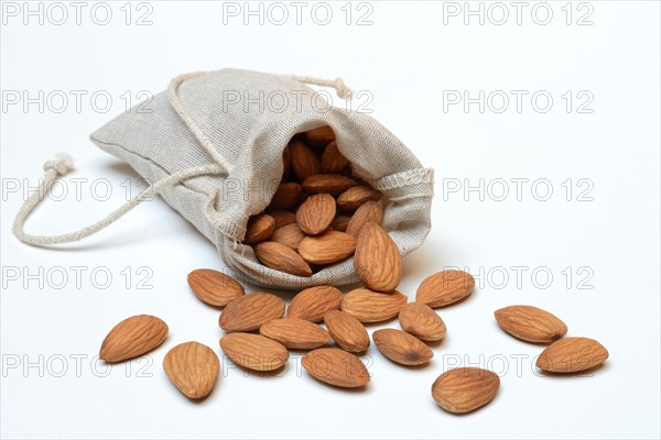 Sweet almonds in linen bags