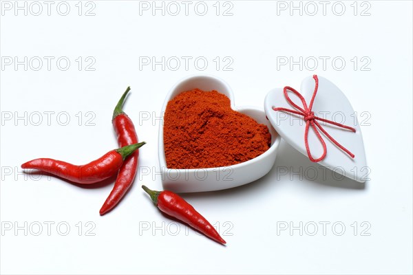 Chili powder in bowl with heart shape