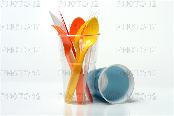 Plastic cups and plastic cutlery