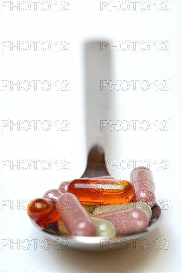 Capsules on spoon