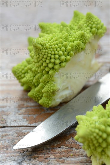 Romanesco cabbage with knife