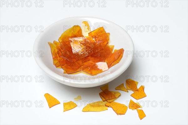 Shellac flakes in bowl