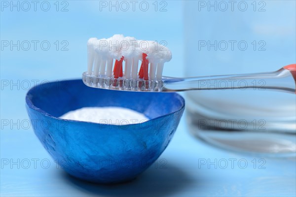 Sodium powder on toothbrush