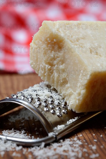 Parmesan cheese with grater