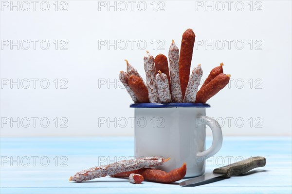 Different kinds of Dauerwurst in cup