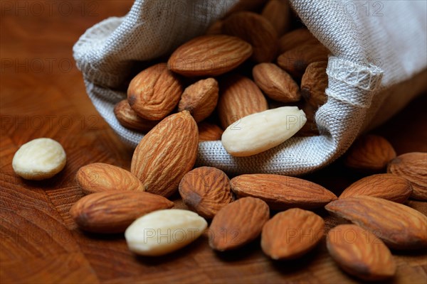 Sweet almonds in linen bags