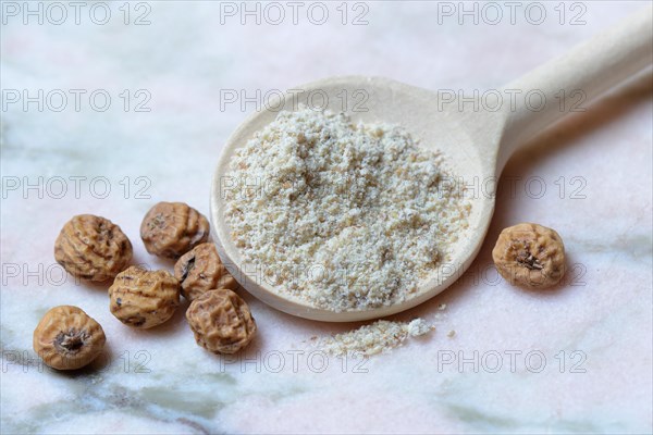 Tigernuts and tigernut flour in cooking spoon
