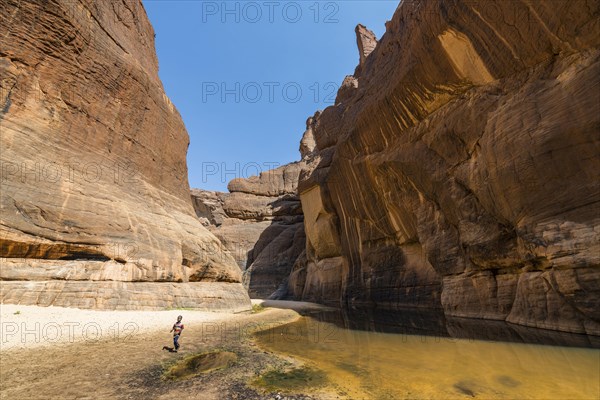 Boy at Guelta d'Archei waterhole