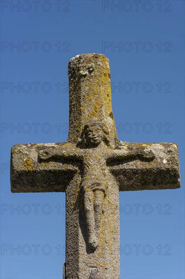 Stone cross of church Saint-Hilaire