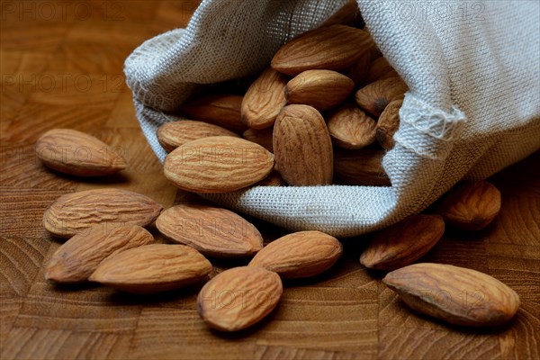 Sweet almonds in linen bags