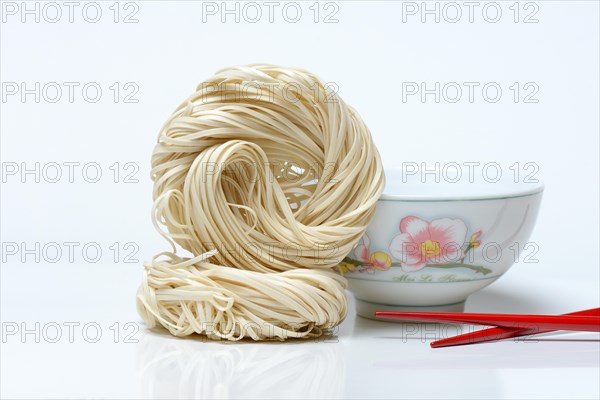 Chinese noodles and bowl with chopsticks