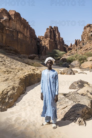 Young Beduin in traditional clothes at Guelta d'Archei waterhole