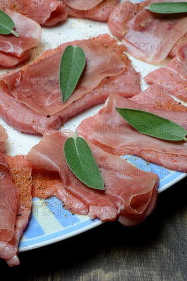 Preparation of Saltimbocca alla romana