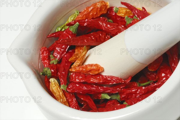 Dried chilli peppers in grating bowl