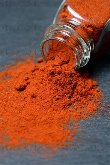 Paprika powder in glass bottle