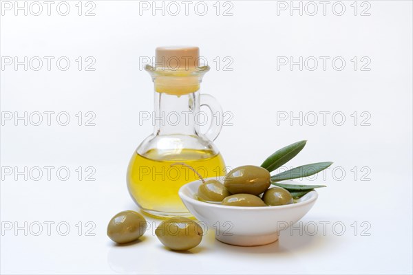 Green olives in shell and bottle olive oil