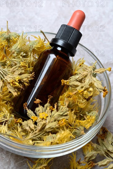 Dried calendula blossoms in bowl