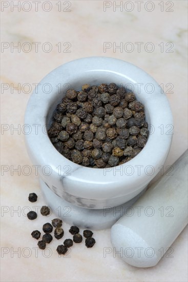 Tellicherry pepper in mortar