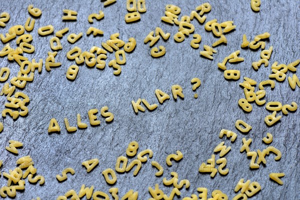 Letter noodles make word