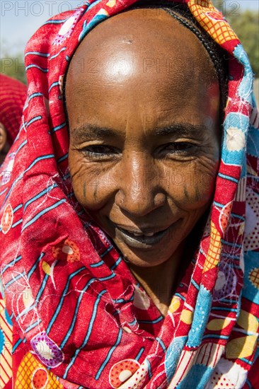 Colourful dressed woman