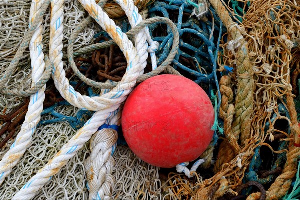 Ship ropes and fishing nets with floating ball