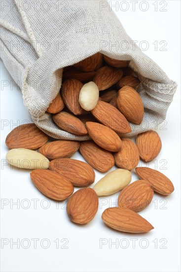 Sweet almonds in linen bags