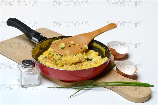 Scrambled eggs in frying pan