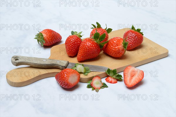 Strawberries on wooden board