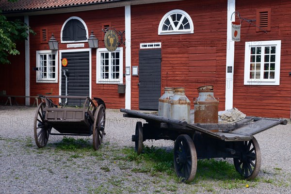 Cart with milk cans