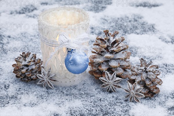 Natural outdoor Advent decoration with ice and snow