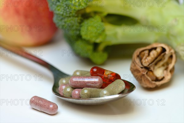 Capsules on spoon