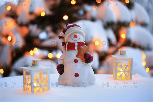 Atmospheric outdoor Christmas decoration with snowman