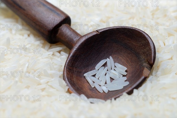 Basmati rice in wooden spoon