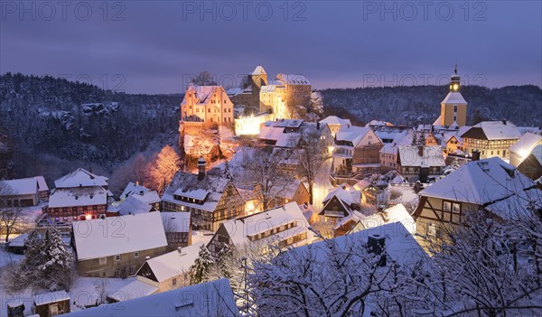 Place Hohnstein with rock castle at snow