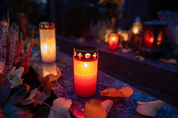 Burning grave light on a grave