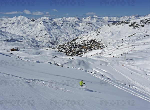 Skier skiing in deep snow